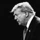 A black-and-white photo of Trump against a black background