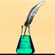 A beaker with a feather pen in it.