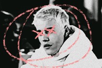 A grainy photo of Justin Bieber with his head circled and his eyes x-ed out