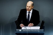 A photo of German Chancellor Olaf Scholz giving a speech