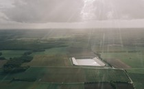 The Mauzè-sur-le-Mignon reservoir — a silver rectangle among fields of green