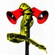 A yellow snake wrapped around a megaphone alarm pole