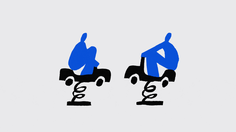 two figures riding a bouncy car at a playground
