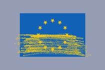 A European Union flag with a yellow brush of paint over it