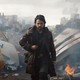 Diego Luna marching through a smoky landscape in "Andor"