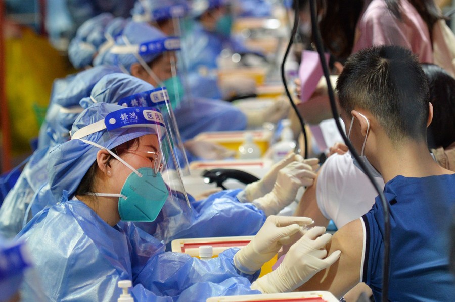 Several people are vaccinated together.