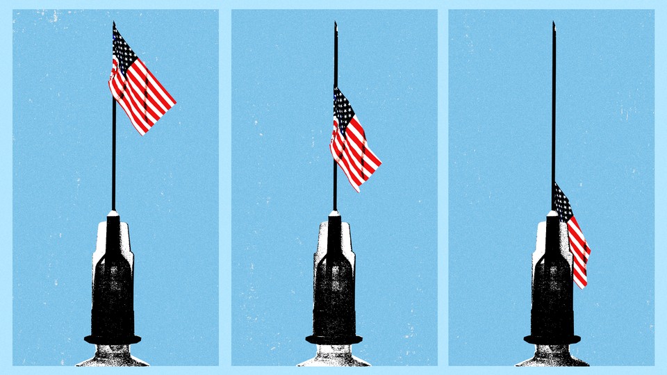 the american flag lowers down the needle of a vaccine