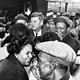 Kennedy greets residents of the all–African American community of Brooklyn, a suburb in Illinois, Oct. 3, 1960. He had not scheduled a campaign stop there. When he noticed a crowd had turned out with a brass band, he stopped and greeted many of them.