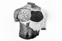 A man's torso in black and white collaged together from different textures