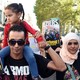 People take part in a demonstration to protest against the mayor of the French city of Beziers and to support Syrian refugees.