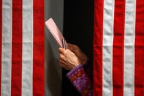 Someone in a voting booth