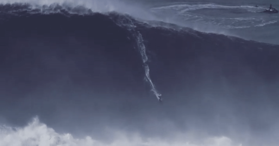 Woman surfs biggest wave clearance