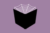 book with cobwebs