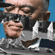 Composite image of J. Edgar Hoover and marching Klansmen
