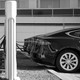 Five Tesla electric cars are shown charging in the Netherlands.