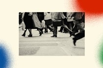 A black-and-white image shows people crossing the street. Some are carrying briefcases, and others are suit pants, long back skirts, and long trench coats.The photo is set against a background with three spray-painted circles. In the bottom-left corner is a blue one, in the bottom-right corner is a green one, and in the top-right corner is a red one.