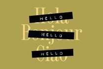 An image of the word "hello: translated into Spanish, French, and Italian, which have been obscured with the word "hello" written in English.