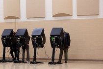 Voters cast their ballots at a polling location