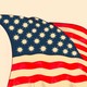 An illustration of an American flag with coronavirus cells replacing the stars.