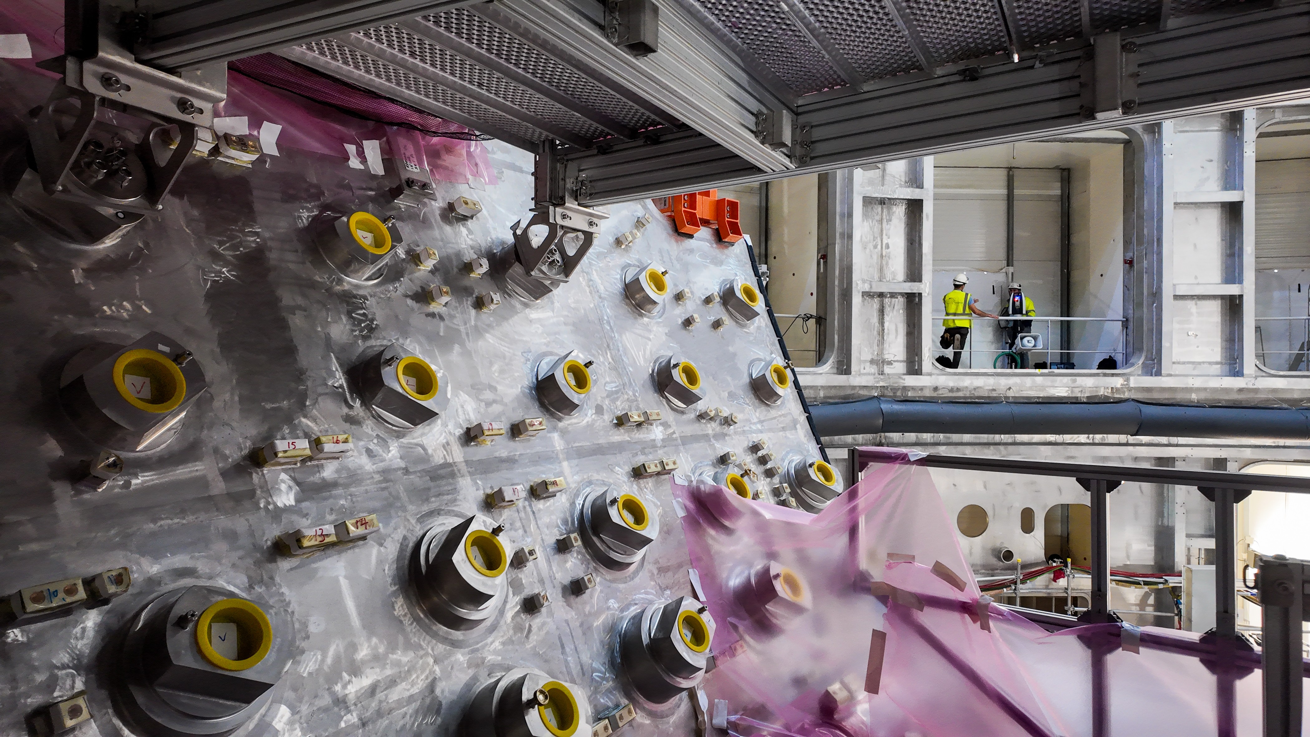 The interior of a complex steel chamber, part of a fusion reactor