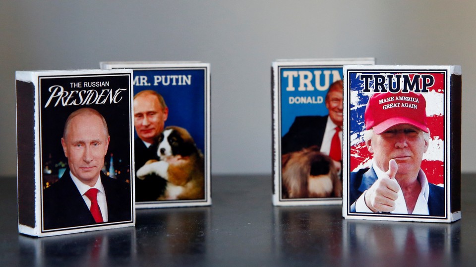 Matchboxes with images of Trump and Putin in a shop window in Helsinki, Finland