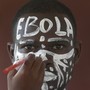 An actor with "EBOLA" written across his forehead