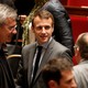 Emmanuel Macron leaves after the government session at the National Assembly in Paris, France, on May 10, 2016.