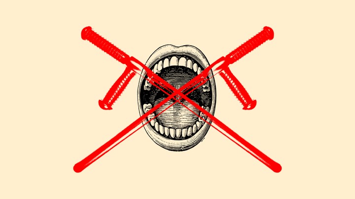 An illustration of an open mouth with an X over it.