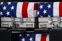 Dignified transfer cases belonging to Major Jeffery R. OBrien, Captain Cody A. Khork, and Sergeant First Class Nicole M. Amor during a dignified transfer at Dover Air Force Base in Dover, Delaware, US, on Saturday, March 7, 2026