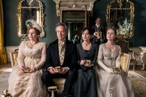 Lydia Rose Bewley, Richard E. Grant, Dakota Johnson, and Yolanda Kettle sitting in a parlor holding teacups in "Persuasion"
