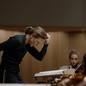 Cate Blanchett conducts an orchestra in "Tár"