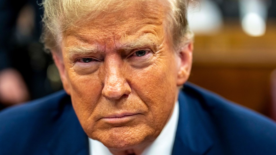 A photo portrait of Trump appearing in court.