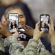 U.S. troops snapped photos of President Barack Obama after he delivered a speech in Seoul on April 26, 2014.