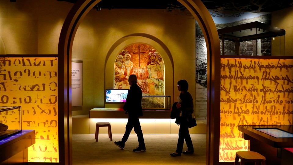 People walk through an exhibit at the Museum of the Bible in Washington, D.C.