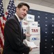 House Speaker Paul Ryan pointing to boxes of petitions supporting a tax-reform bill
