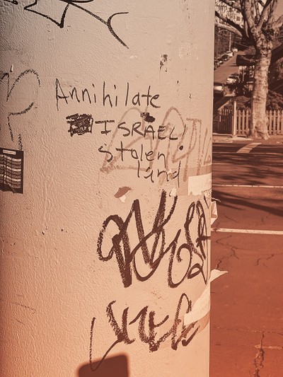 photo of graffiti reading "Annihilate ISRAEL! stolen land"