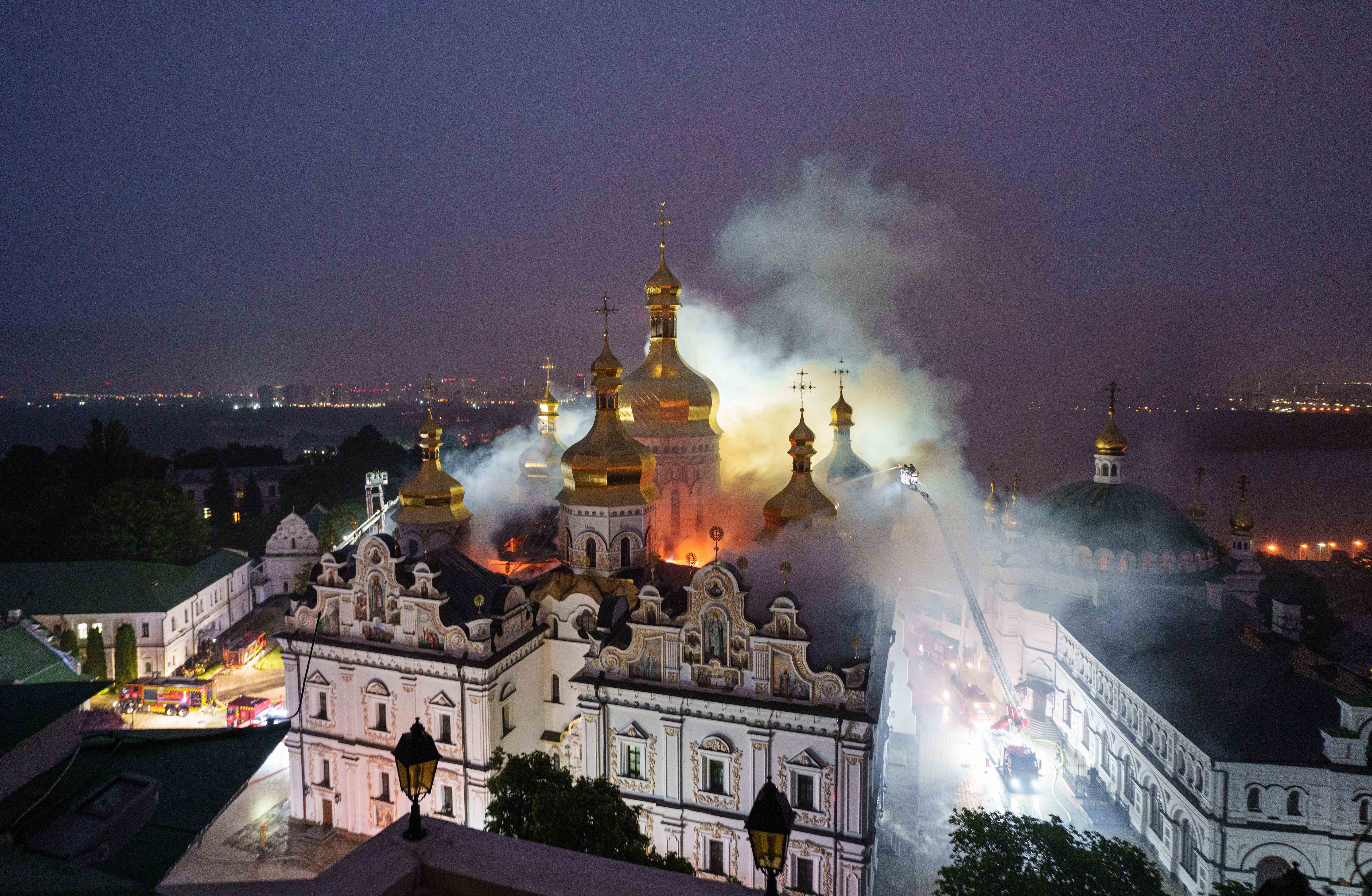 Firefighters work to put out a fire at a historic cathedral in Ukraine.