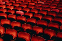 Rows of empty theater seats