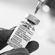 A picture of a vial of a COVID-19 vaccine