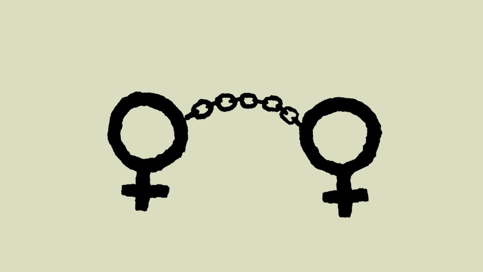 A pair of handcuffs shaped like female symbols