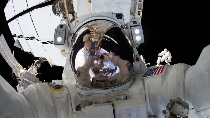 An astronaut's reflective visor