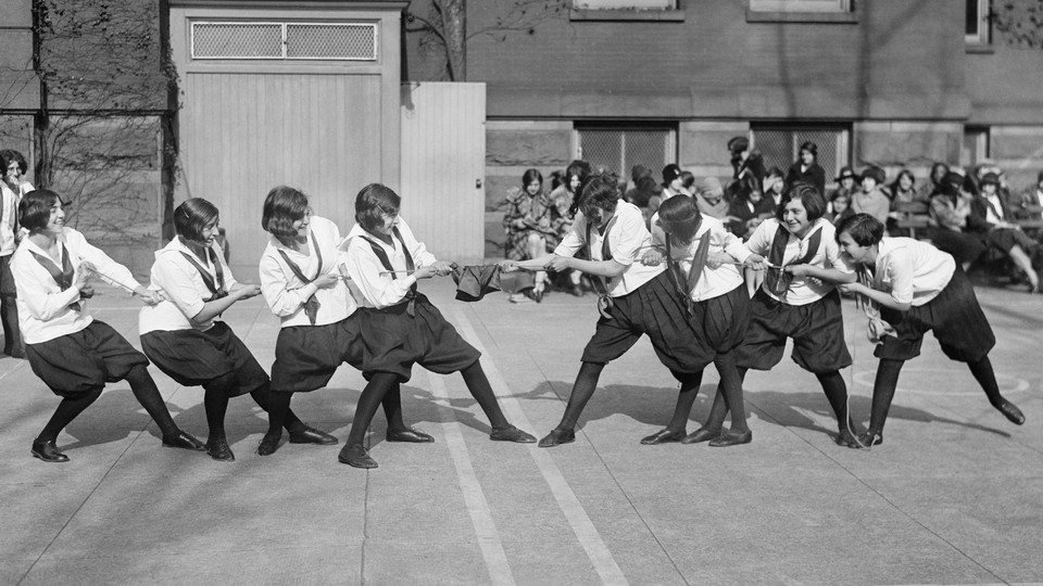 A group of students playing tug-of-war