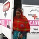 A woman exits a mobile cancer-detection unit in Chandigarh, India.