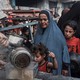 A line for hot meals in Gaza's al-Zeitoun neighborhood