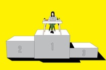 A woman works at her home office on a pedestal with three places.
