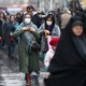 People in Iran wearing face masks