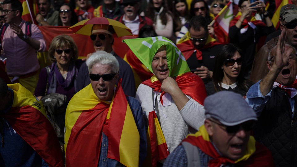 Vox supporters attend a rally in Barcelona in March 2019.