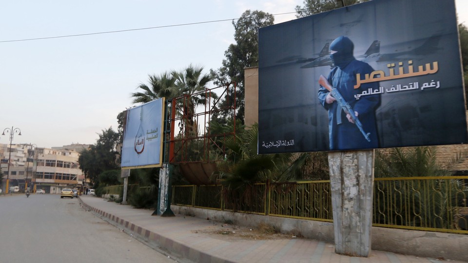 A billboard promoting the Islamic State in Raqqa, Syria. 