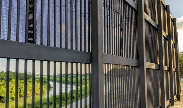 From the Brownsville side, the wall. On the other side is the Rio Grande, whose centerline marks the official border between the United States and Mexico in this part of Texas.