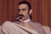 Frank Zappa smoking a cigarette